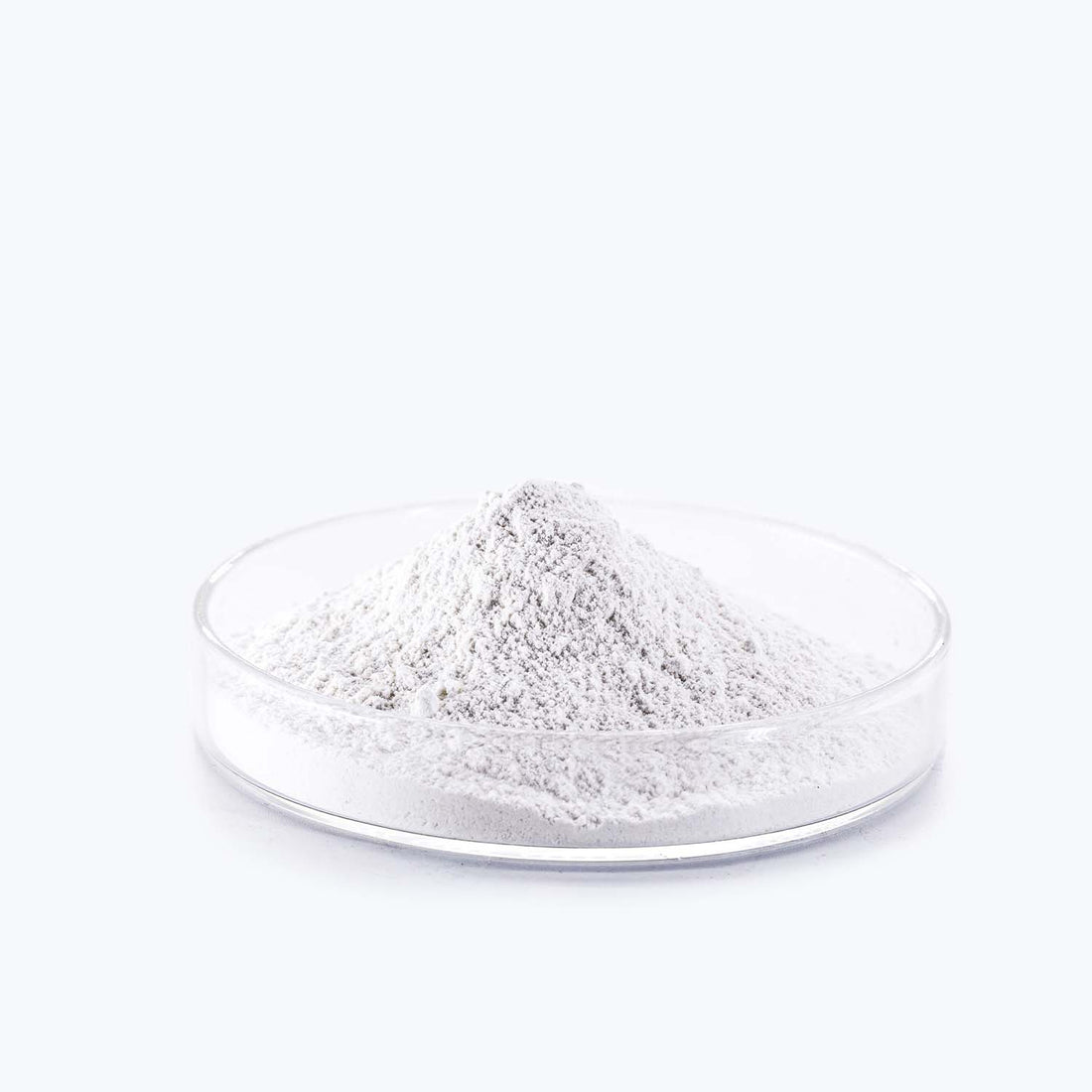 A bowl of white powder, Benzoyl Peroxide, on a white background.