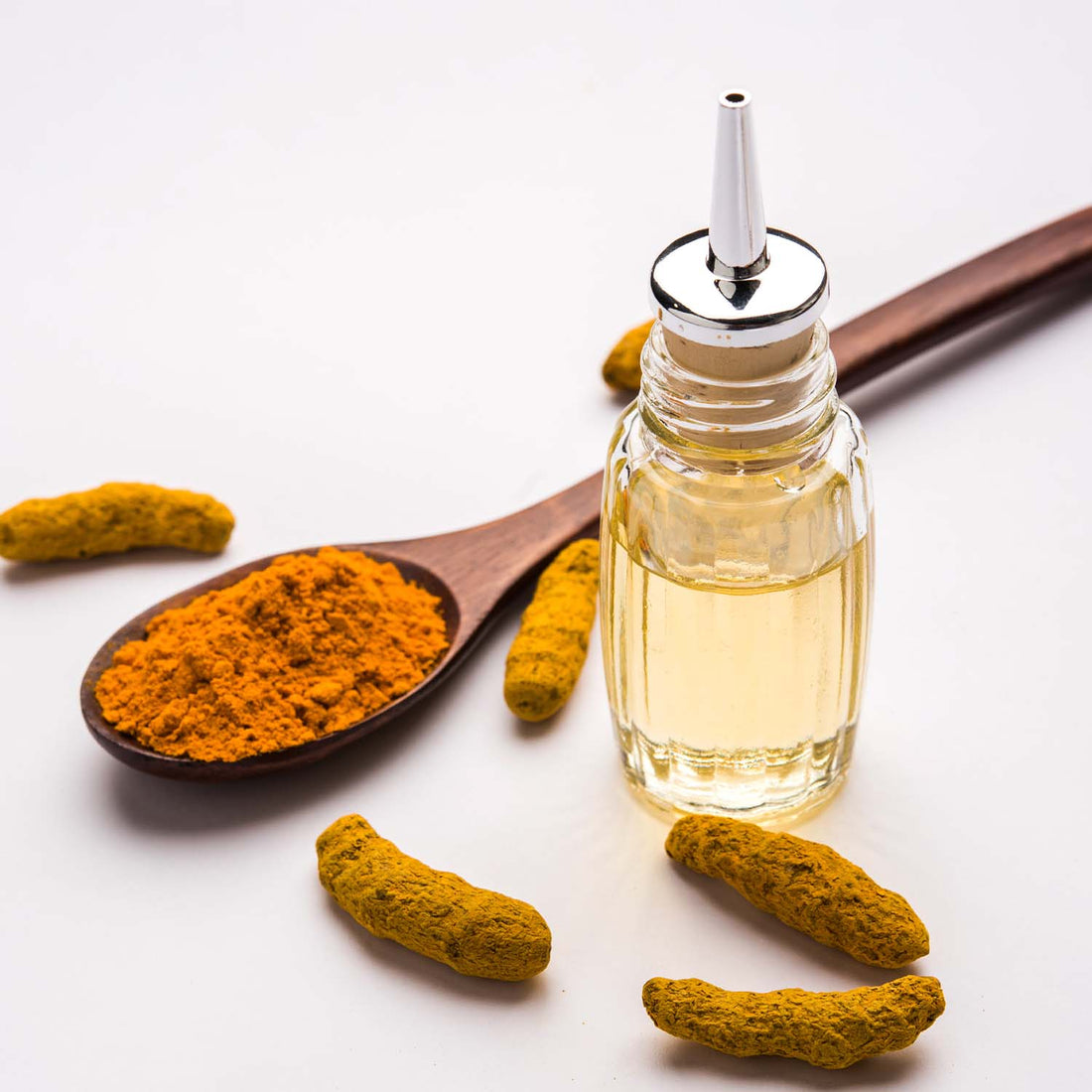Turmeric (Curcuma Longa) Root Oil: A vibrant yellow oil derived from the turmeric root, known for its anti-inflammatory and antioxidant properties.