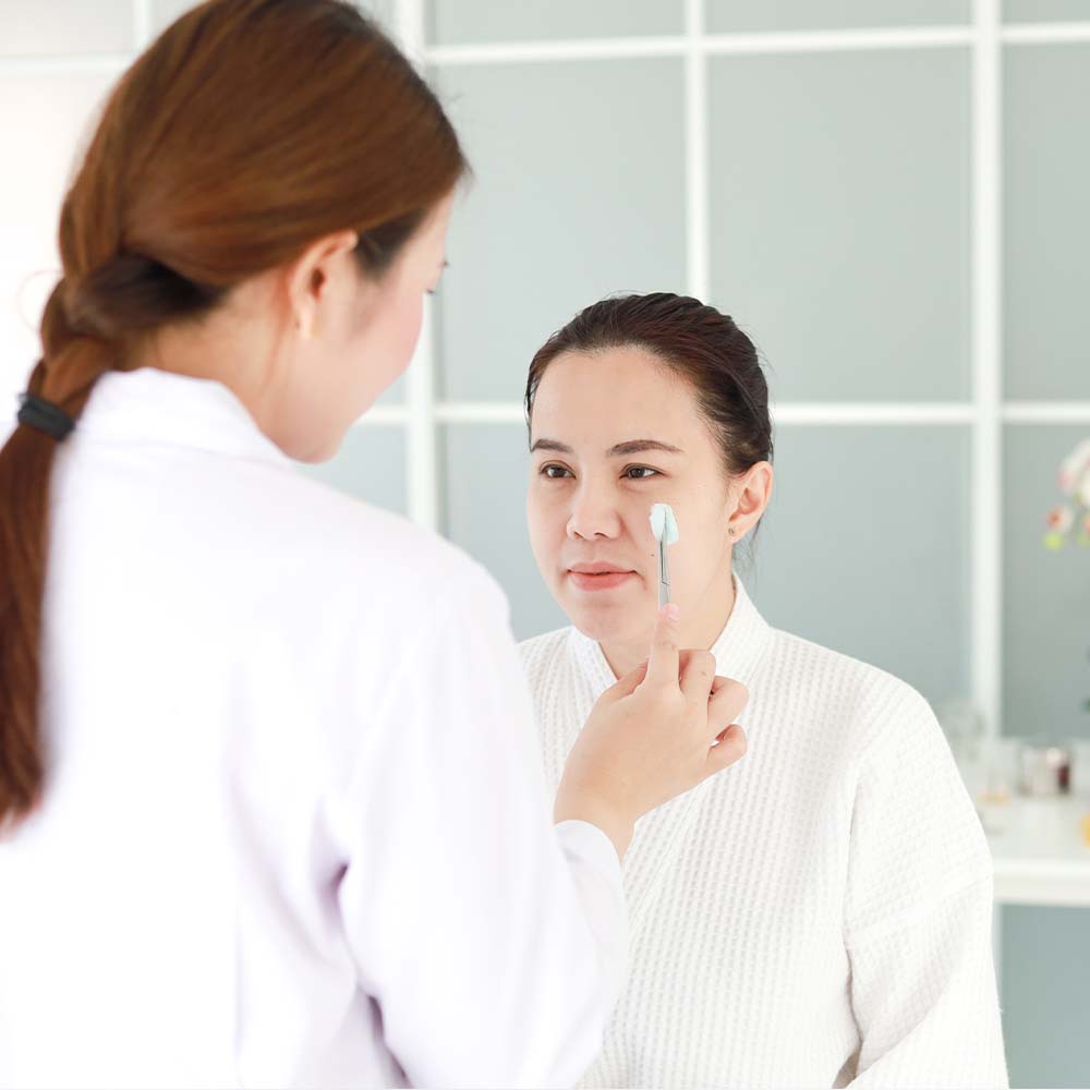a girl understanding different acne types from a dermatologist